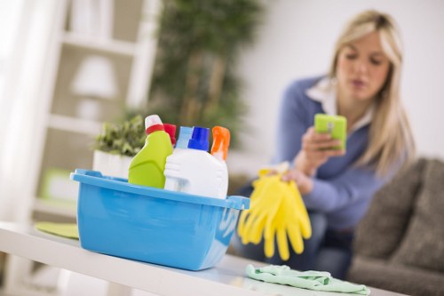 Staff member using carpet cleaning machine with safety care